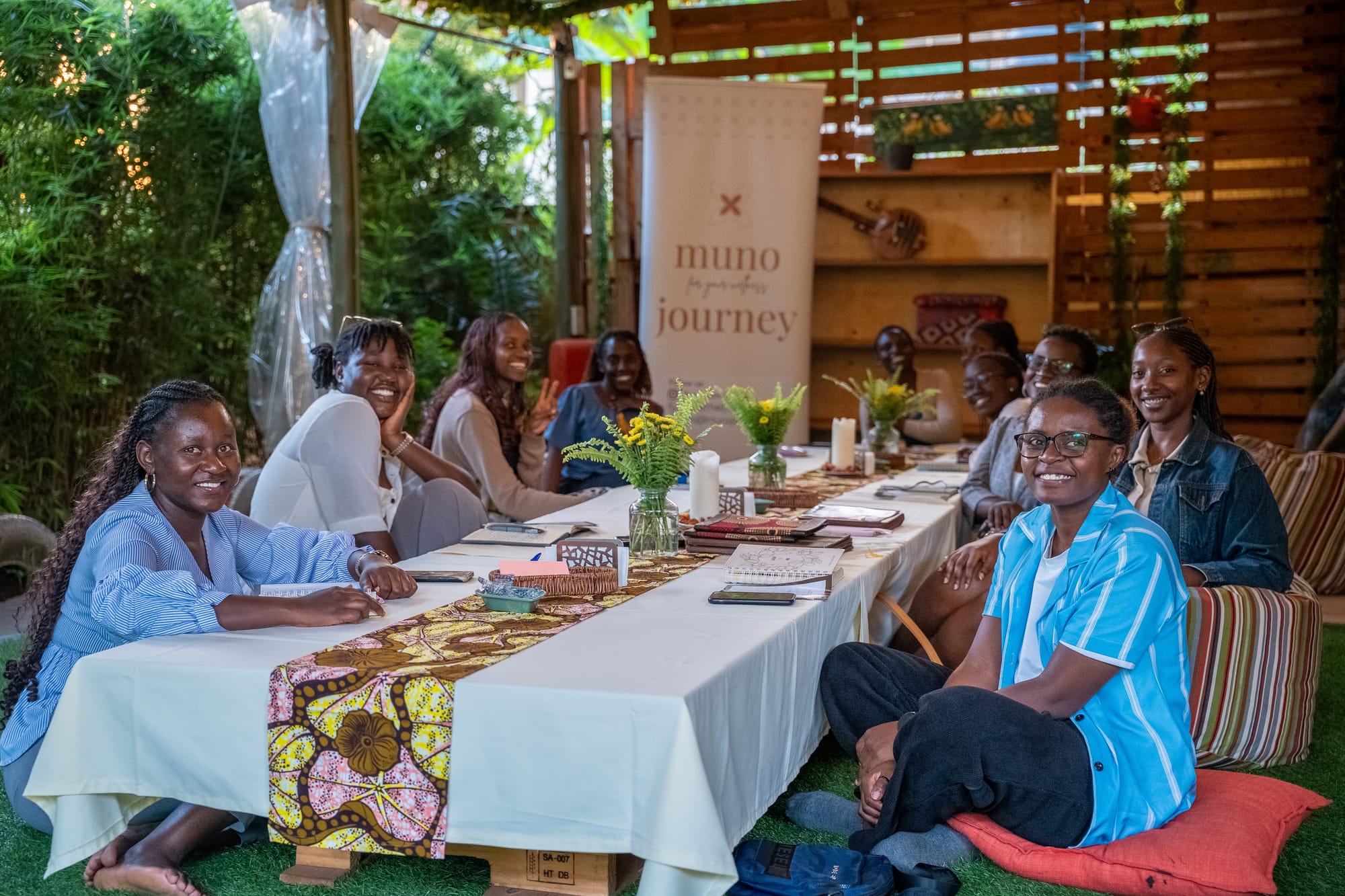A lively table of guests at a KaraSpace event