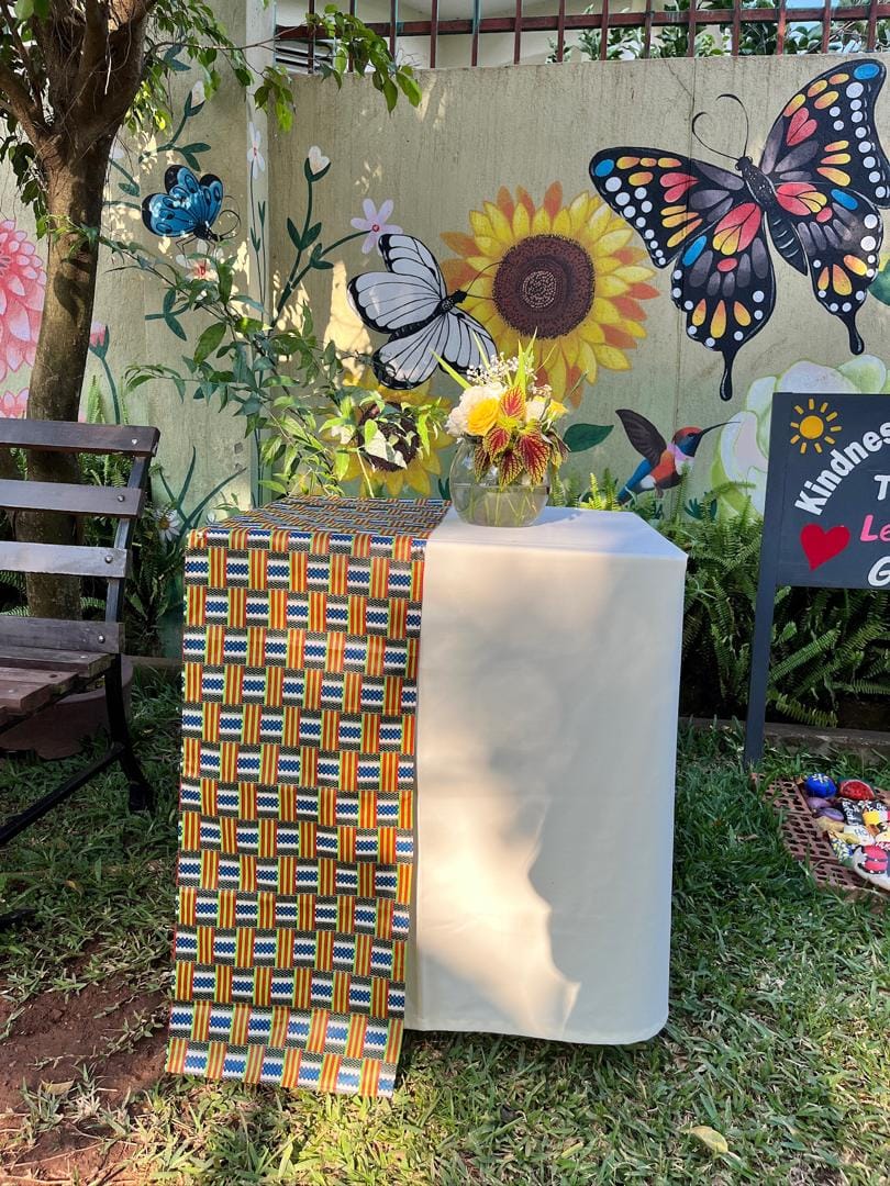 The kindness corner in the KaraSpace garden — Take One, Leave One, Give One